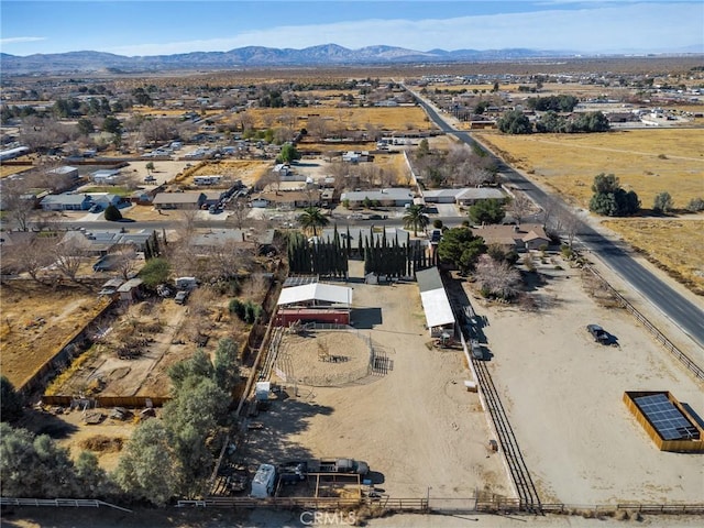 drone / aerial view featuring a mountain view