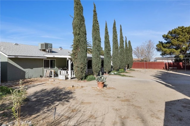 view of yard featuring central AC