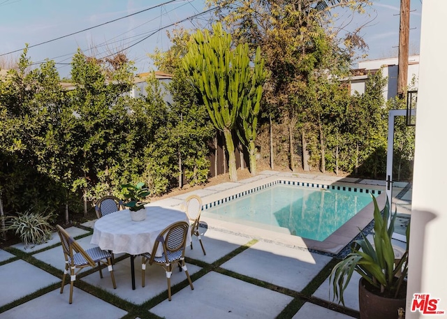 view of pool with a patio