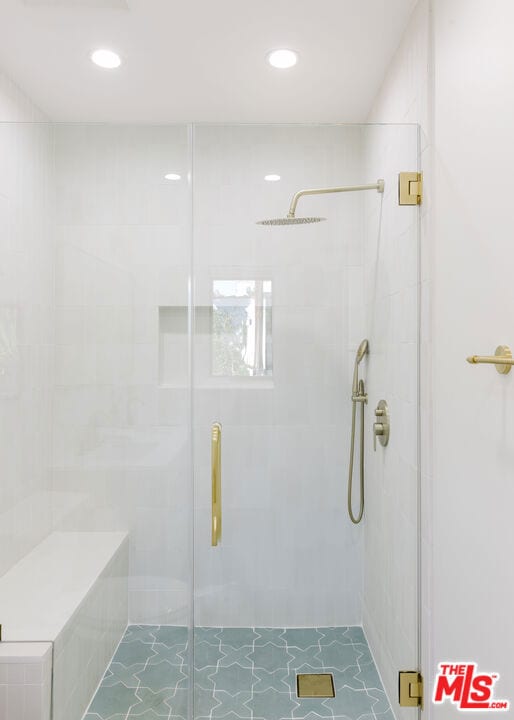 bathroom featuring walk in shower