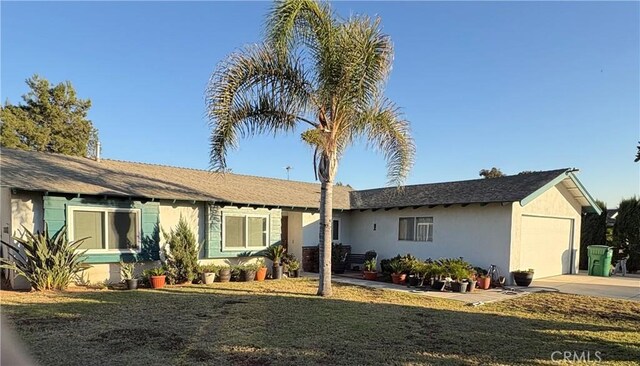 ranch-style home with a garage