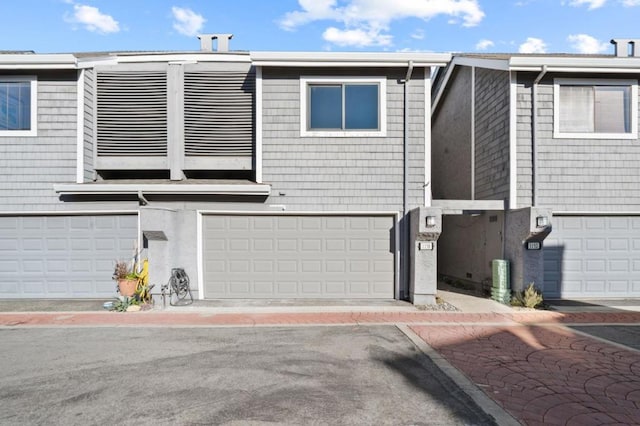 view of property featuring a garage