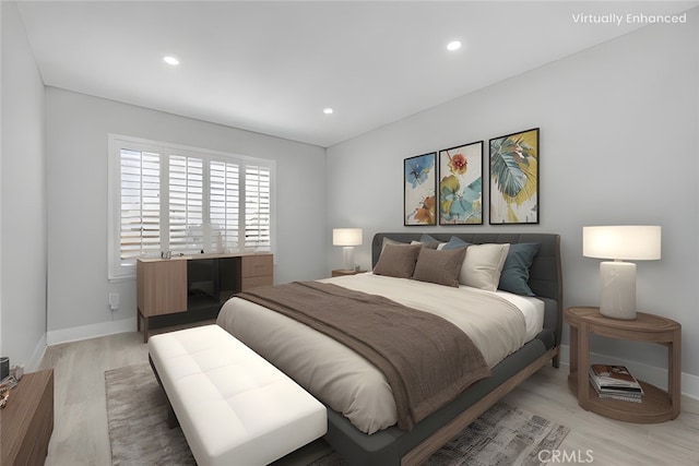 bedroom featuring light hardwood / wood-style flooring