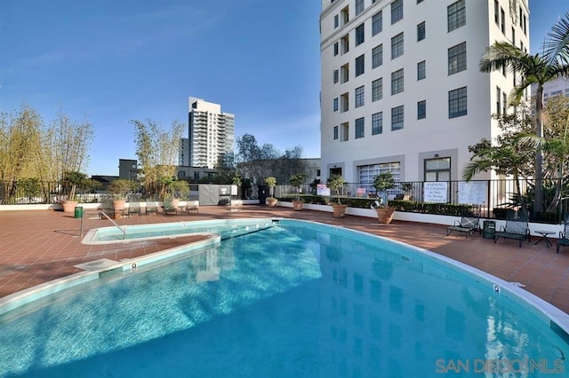 view of pool featuring a patio