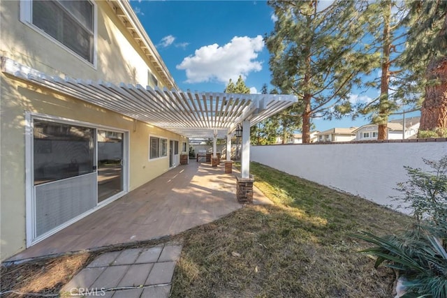 view of yard featuring a pergola and a patio