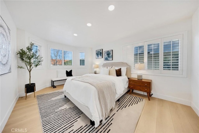 bedroom with light hardwood / wood-style floors