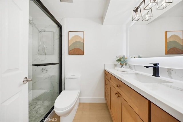 bathroom featuring vanity, walk in shower, and toilet