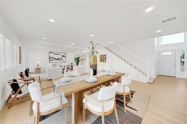 dining room with light hardwood / wood-style floors