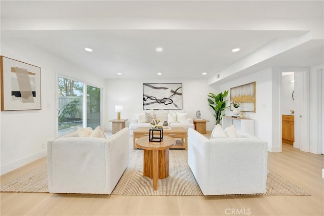 living room with light hardwood / wood-style flooring