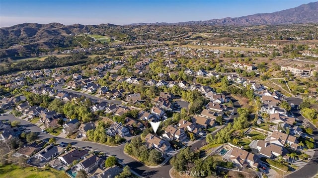 drone / aerial view featuring a mountain view