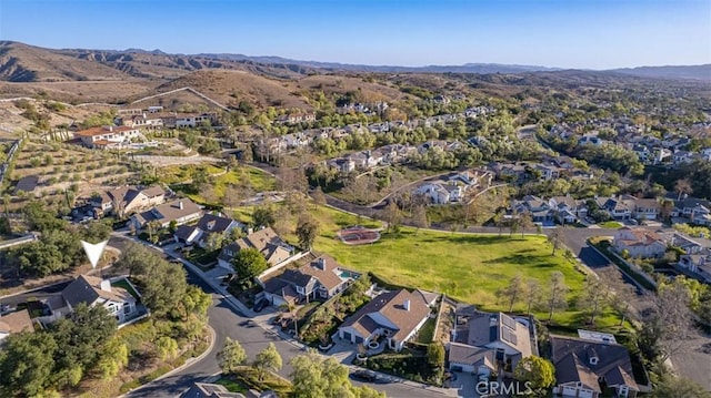 drone / aerial view featuring a mountain view