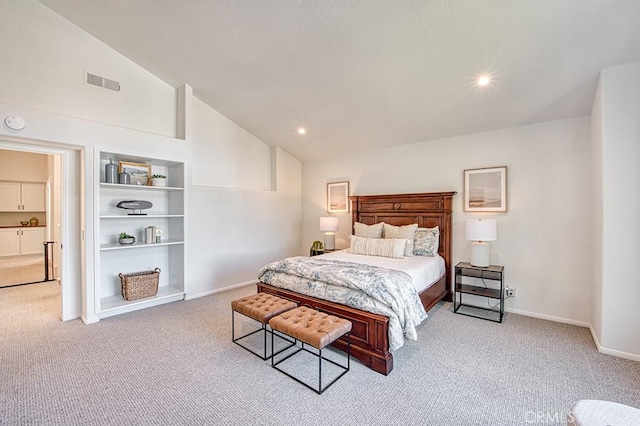 carpeted bedroom featuring vaulted ceiling