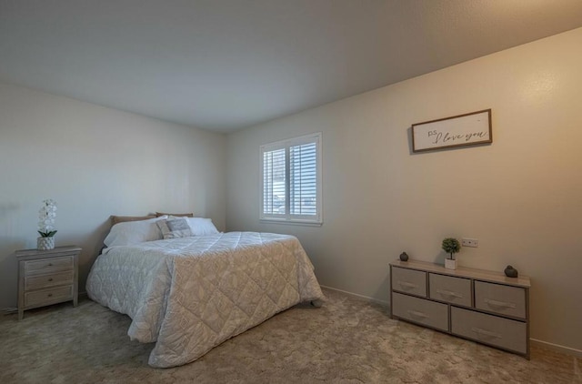 bedroom with light carpet