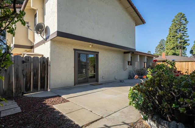 rear view of property with a patio area