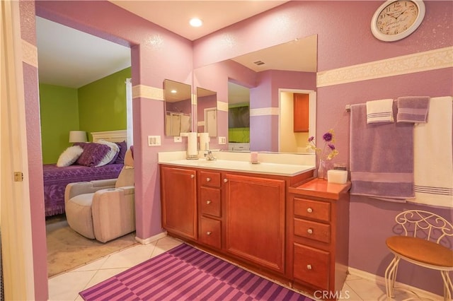 bathroom with vanity and tile patterned floors