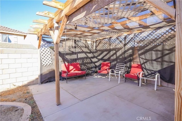 view of patio featuring a pergola