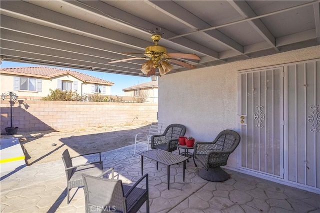 view of patio / terrace featuring ceiling fan