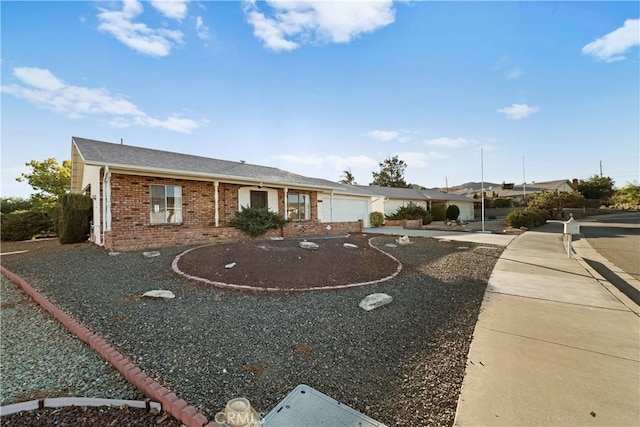 ranch-style home with a garage