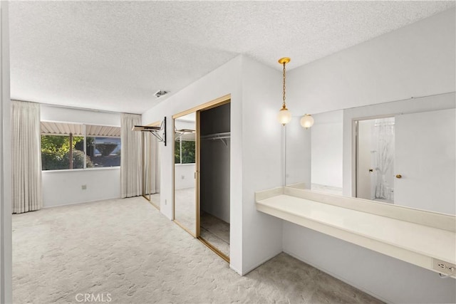 bathroom with a textured ceiling