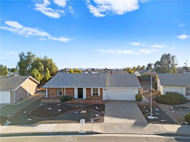 ranch-style home featuring a garage