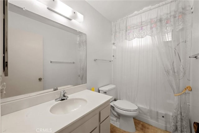 full bathroom with toilet, shower / tub combo, and vanity