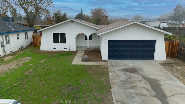 single story home featuring a garage and a front lawn