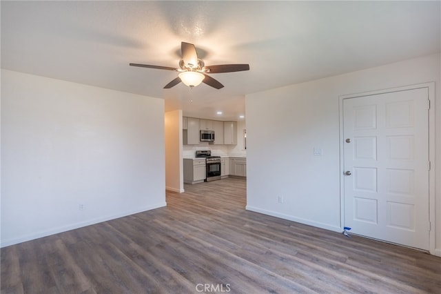 unfurnished living room with ceiling fan and light hardwood / wood-style flooring