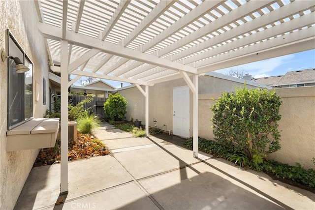 view of patio featuring a pergola