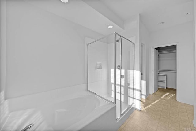 bathroom with independent shower and bath