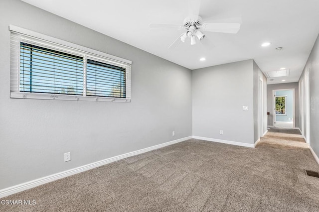 carpeted empty room with ceiling fan