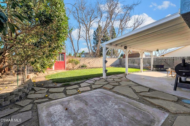 view of patio featuring an outdoor structure