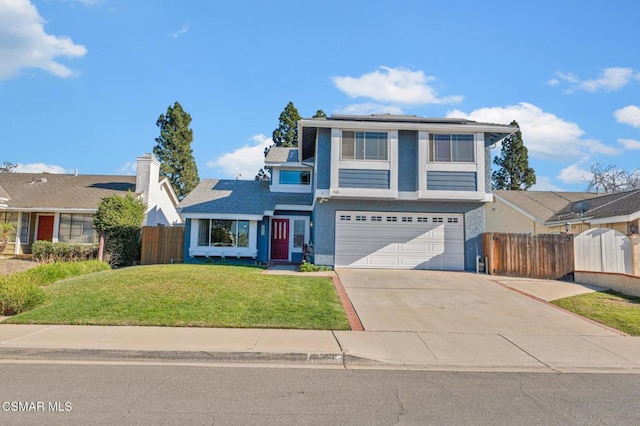 front of property featuring a front lawn, a garage, and solar panels