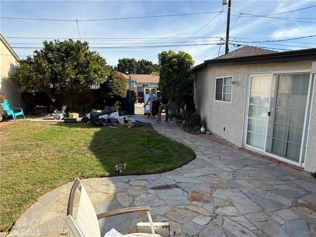 view of yard with a patio area