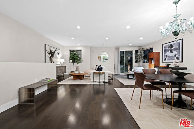 dining area with dark hardwood / wood-style floors