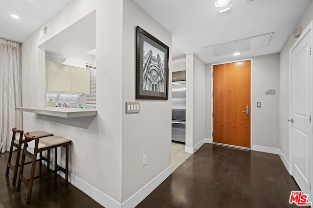 entrance foyer with hardwood / wood-style flooring