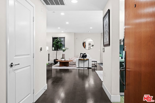 hall with dark hardwood / wood-style floors