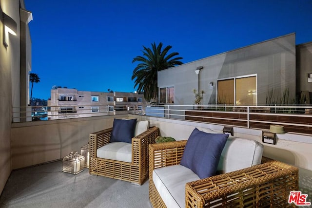 view of patio with a balcony