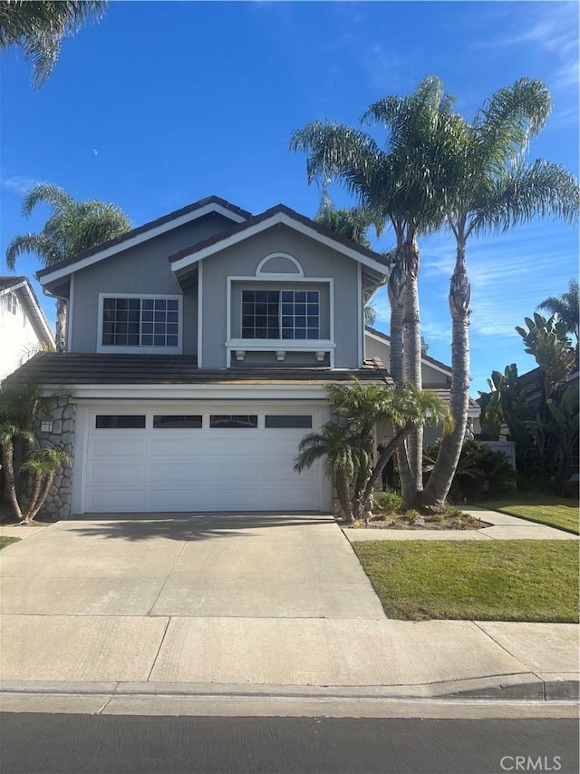 front of property featuring a garage