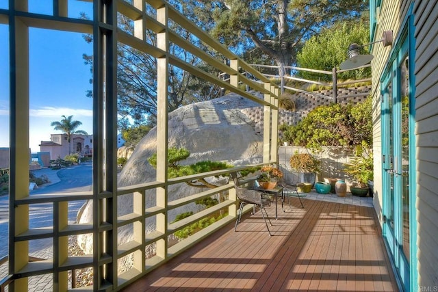 unfurnished sunroom featuring a wealth of natural light