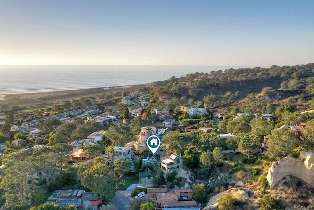 aerial view with a water view and a view of the beach