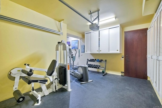 workout room featuring electric panel