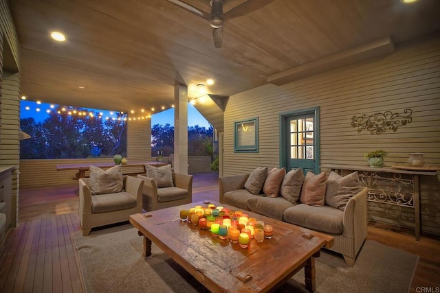 view of patio / terrace featuring a deck, outdoor lounge area, and ceiling fan