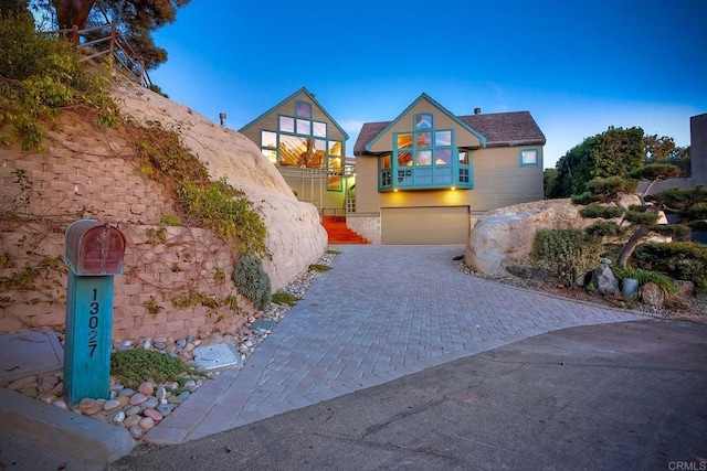 view of front of property with a garage