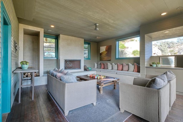 living room with wood-type flooring