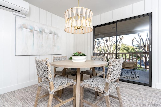 carpeted dining room featuring a wall unit AC, a chandelier, and wooden walls