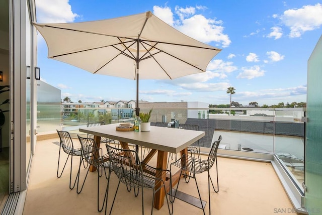 view of patio / terrace with a balcony