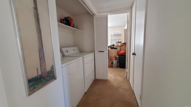 washroom featuring light colored carpet and washing machine and clothes dryer