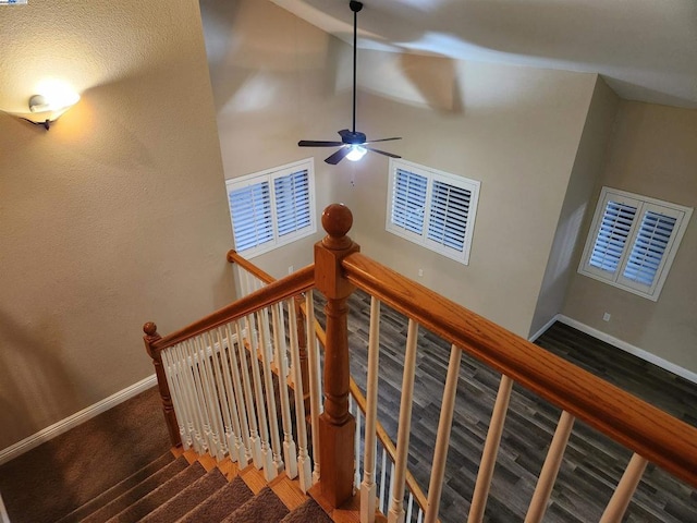 staircase with lofted ceiling