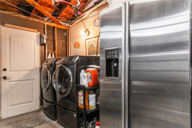 laundry room featuring washing machine and dryer