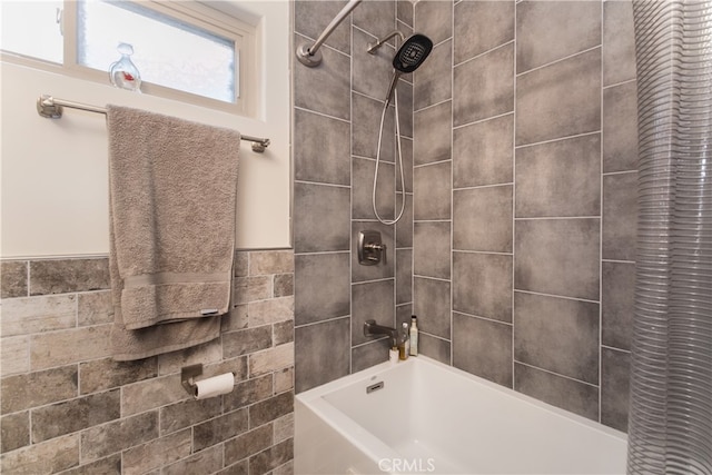 bathroom featuring shower / bathtub combination with curtain